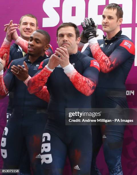 Great Britain Men's Bobsleigh GBR-1 Team of Stuart Benson, Joel Fearon, John Jackson and Bruce Tasker after their fourth run of the men's 4 man...