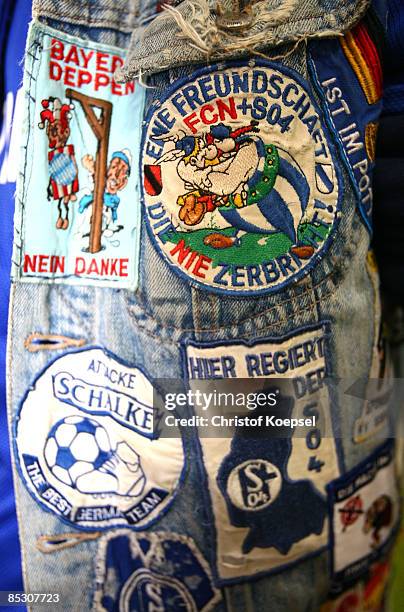 Fan stickers of a fan of Schalke are seen during the Bundesliga match between FC Schalke 04 and 1. FC Koeln at the Veltins-Arena on March 6, 2009 in...