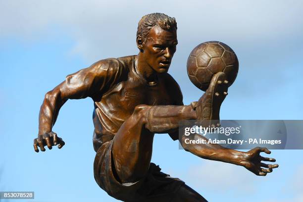 Statue of Dennis Bergkamp after being unveiled before the Barclays Premier League match at the Emirates Stadium, London.