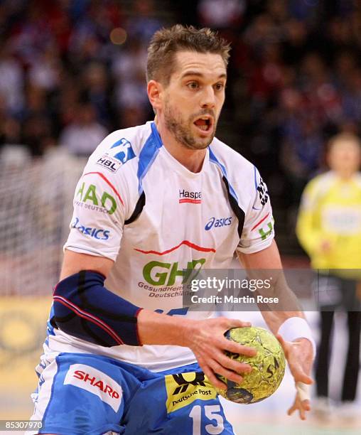 Guillaume Gille of Hamburg throws the ball during the Bundesliga match between HSV Hamburg and TV Grosswallstadt at the Color Line Arena on March 7,...