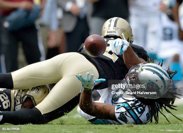 Kelvin Benjamin of the Carolina Panthers makes a juggling catch against P.J. Williams of the New Orleans Saints during their game at Bank of America...