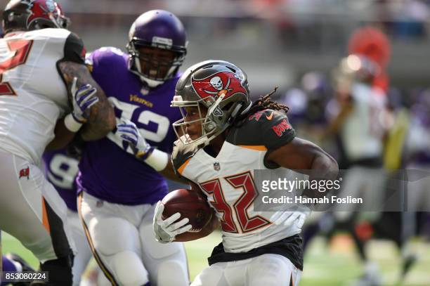 Jacquizz Rodgers of the Tampa Bay Buccaneers carries the ball in the first half of the game against the Minnesota Vikings on September 24, 2017 at...