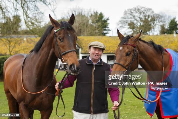 Trainer Nicky Henderson with My Tent or Yours and Bobs Worth during a stable visit at Seven Barrows, Lambourn.