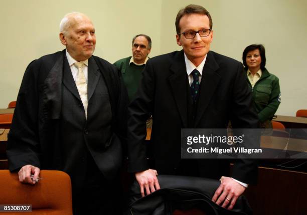 Helg Sgarbi and his German lawyer Egon Geis react prior to the verdict at the country court on March 9, 2009 in Munich, Germany.Sgarbi has been...