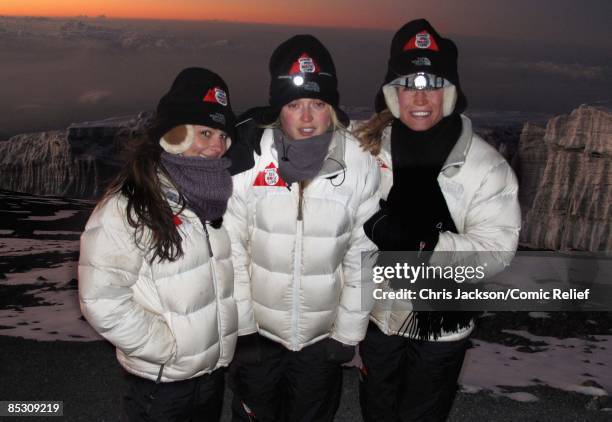 Cheryl Cole, Fearne Cotton and Denise Van Outen pose for a photo in front of the Kilimanjaro Glacier as they reach the top of Mount Kilimanjaro on...
