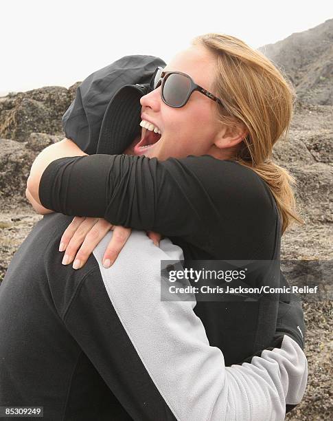 Gary Barlow and Kimberley Walsh embrace on the fifth day of The BT Red Nose Climb of Kilimanjaro on March 5, 2009 in Arusha, Tanzania. Celebrities...