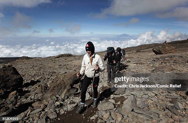 Ben Shephard and Fearne Cotton trek on the seventh day of The BT Red Nose Climb of Kilimanjaro on March 7, 2009 in Arusha, Tanzania. Celebrities...