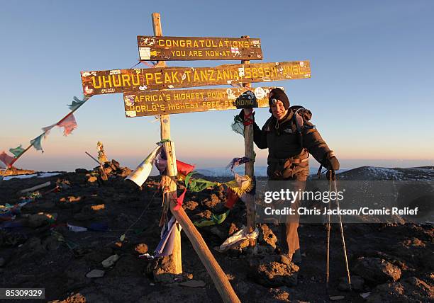 Ben Shephard, poses for a photograph on top of Mount Kilimanjaro on the seventh day of The BT Red Nose Climb of Kilimanjaro on March 7, 2009 in...