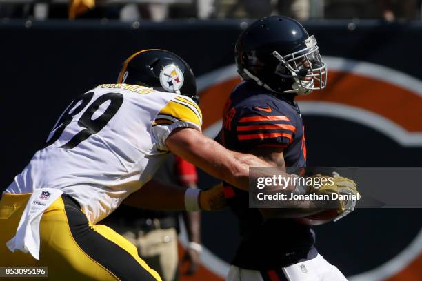 Vance McDonald of the Pittsburgh Steelers strips the ball from Marcus Cooper of the Chicago Bears, resulting in a fumble, in the second quarter at...