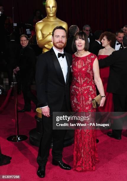 Mchael and Adele Fassbender arriving at the 86th Academy Awards held at the Dolby Theatre in Hollywood, Los Angeles, CA, USA, March 2, 2014.