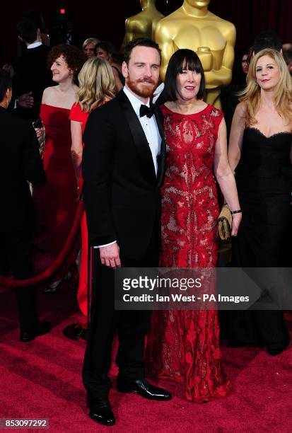 Mchael and Adele Fassbender arriving at the 86th Academy Awards held at the Dolby Theatre in Hollywood, Los Angeles, CA, USA, March 2, 2014.