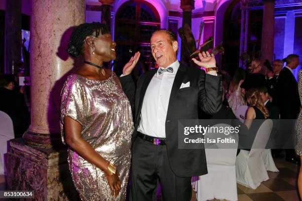 Auma Obama, halfsister of former US president Barack Obama and German singer Michael Holm during the Minx Fashion Night in favour of 'Sauti Kuu' of...