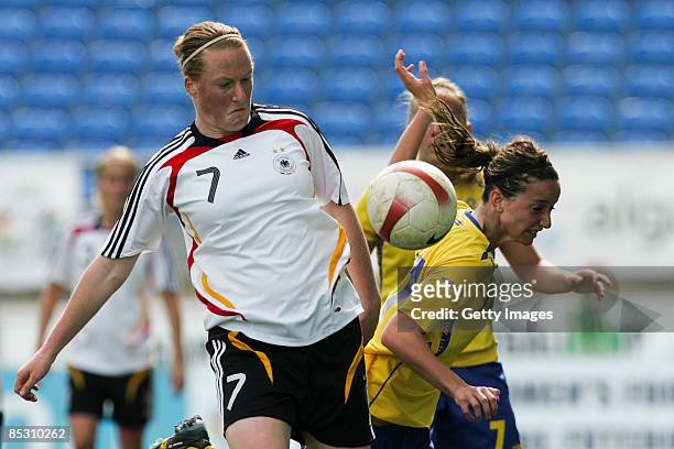 Melanie Behringer from Germany competes with Victoria Svensson from Sweden during the Women Algarve Cup match between Germany and Sweden at the...