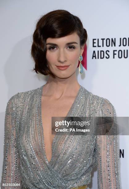 Paz Vega arrives for the Elton John AIDS Foundation's 22nd annual Academy Awards Viewing Party at West Hollywood Park in Los Angeles.