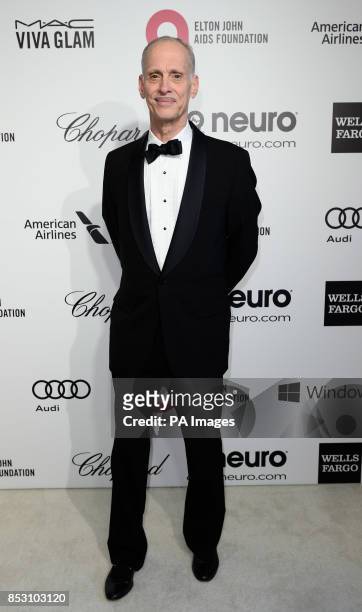 John Waters arrives for the Elton John AIDS Foundation's 22nd annual Academy Awards Viewing Party at West Hollywood Park in Los Angeles.