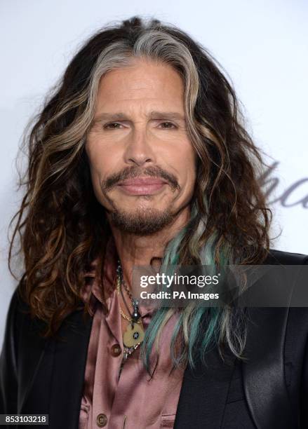 Steven Tyler arrives for the Elton John AIDS Foundation's 22nd annual Academy Awards Viewing Party at West Hollywood Park in Los Angeles.