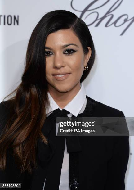 Kourtney Kardashian arrives for the Elton John AIDS Foundation's 22nd annual Academy Awards Viewing Party at West Hollywood Park in Los Angeles.