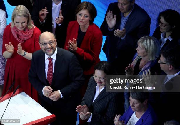 German Social Democrat and chancellor candidate Martin Schulz smiles at the stage next to State Premier of Mecklenburg-Western Pomerania Manuela...