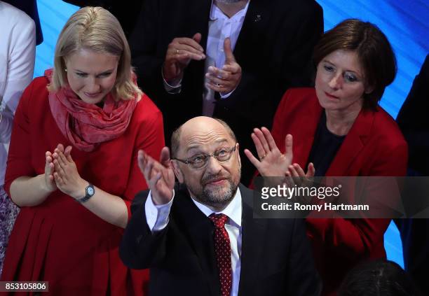 German Social Democrat and chancellor candidate Martin Schulz waves at the stage next to State Premier of Mecklenburg-Western Pomerania Manuela...