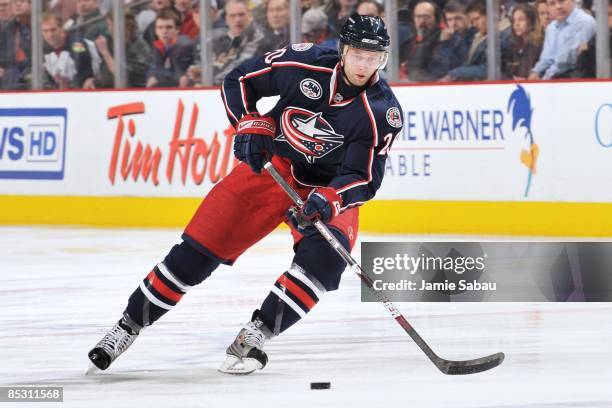 Forward Kristian Huselius of the Columbus Blue Jackets skates with the puck against the Los Angeles Kings on March 3, 2009 at Nationwide Arena in...