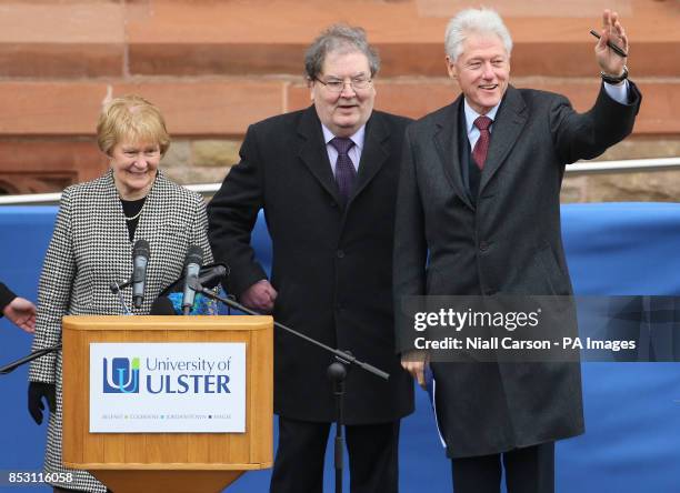 Former US President Bill Clinton with former SDLP leader John Hume and his wife Pat as he pays tribute to the peace maker at the Guildhall in...