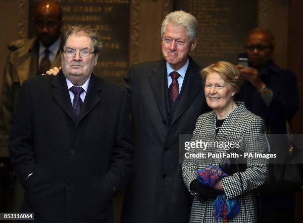 Former US President Bill Clinton with former SDLP leader John Hume and his wife Pat at the Guildhall in Londonderry as part of his visit to the...