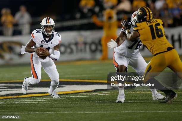 Auburn Tigers quarterback Malik Willis scrambles with the ball during the second half of a college football game against the Missouri Tigers,...