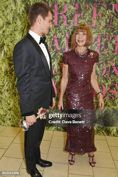 Andrew Garfield, accepting the Best International Designer award on behalf of Green Carpet Fashion Award winner Tom Ford, and presenter Anna Wintour...