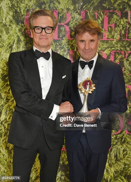 Brunello Cucinelli , winner of the Community & Social Justice award, poses with presenter Colin Firth backstage at The Green Carpet Fashion Awards,...