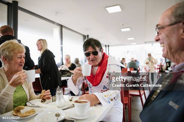 An Elvis impersonator poses at 'The Elvies' on September 24, 2017 in Porthcawl, Wales. 'The Elvies' is an annual gathering of Elvis fans and tribute...
