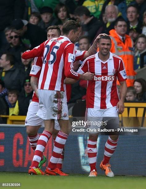 Stoke City's Jonathan Walters celebrates after scoring his team's opening goal from the penalty spot