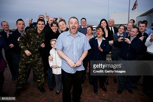 Chris Moyles arrives back in the UK at RAF Northolt after climbing Mount Kilimanjaro in aid of Comic Relief on March 9, 2009 in London, England.