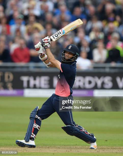 England batsman Moeen Ali hits a six during his century during the 3rd Royal London One Day International between England and West Indies at The...