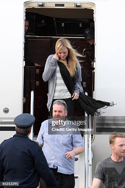 Fearne Cotton and Chris Moyles arrive back in the UK at RAF Northolt after climbing Mount Kilimanjaro in aid of Comic Relief on March 9, 2009 in...