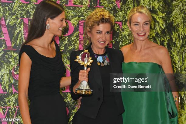 Ilaria Venturini Fendi , winner of The Social Laureate Award, poses backstage with presenters Bianca Balti and Stefania Rocca at The Green Carpet...