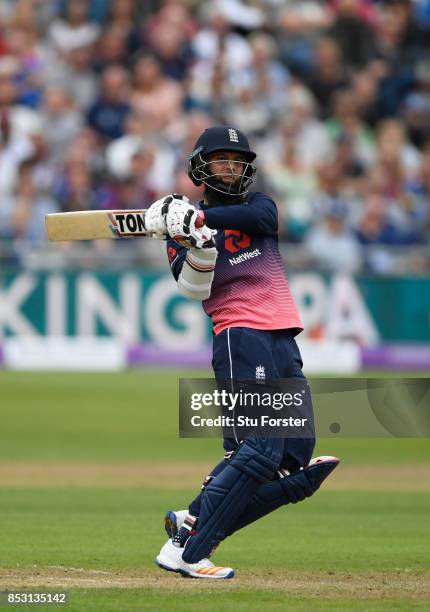 England batsman Moeen Ali hits out during his century during the 3rd Royal London One Day International between England and West Indies at The...