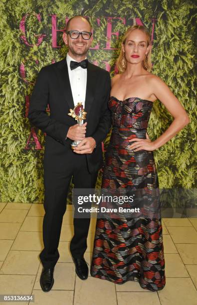 Maximilian Canepa, accepting the Sustainable Producer award on behalf of Taroni, poses backstage with presenter Amber Valletta at The Green Carpet...