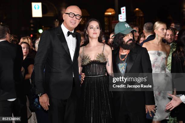 Marco Bizzarri, Dakota Johnson and Alessandro Michele attend the Green Carpet Fashion Awards Italia 2017 during Milan Fashion Week Spring/Summer 2018...