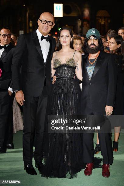 Marco Bizzarri, Dakota Johnson and Alessandro Michele attend the Green Carpet Fashion Awards Italia 2017 during Milan Fashion Week Spring/Summer 2018...