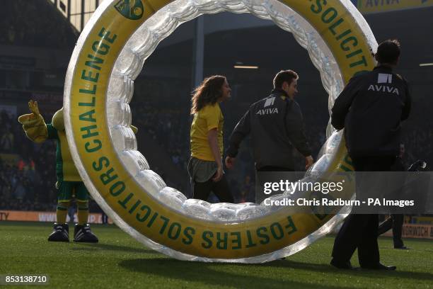 Half-time entertainment on the pitch at Carrow Road