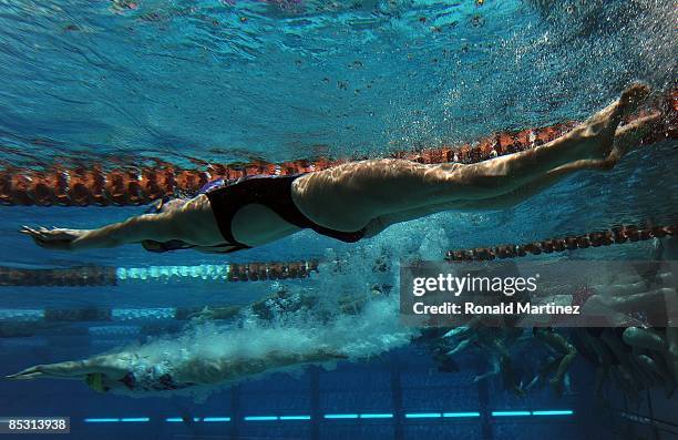 Swimmers warm up during day three of the 2009 USA Swimming Austin Grand Prix on March 7, 2009 at the Lee and Joe Jamail Texas Swimming Center in...