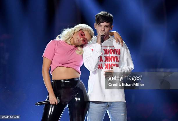 Bebe Rexha and Louis Tomlinson perform during the 2017 iHeartRadio Music Festival at T-Mobile Arena on September 23, 2017 in Las Vegas, Nevada.