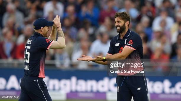 England bowler Liam Plunkett celebrates one of his 5 wickets with Ben Stokes during the 3rd Royal London One Day International between England and...