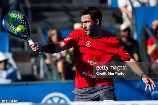 Carlos Gutierrez of Argentina hits a backhand playing with Francisco Navarro of Spain during the Portugal Masters Padel 2017 men's doubles final...