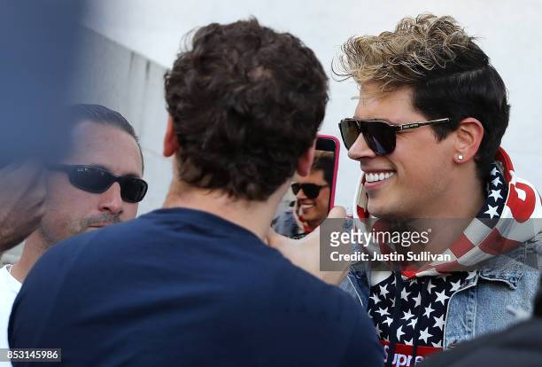 Right wing commentator Milo Yiannopoulos stops to take a picture after speaking during a free speech rally at U.C. Berkeley on September 24, 2017 in...
