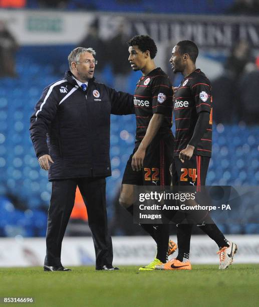 Reading manager Nigel Adkins congratulates Nick Blackman and Shaun Cummings at full time during the Sky Bet Championship match at Elland Road, Leeds.