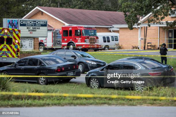 Law enforcement personnel gather around the Burnette Chapel Church of Christ on September 24, 2017 in Antioch, Tennessee. One person was killed and...