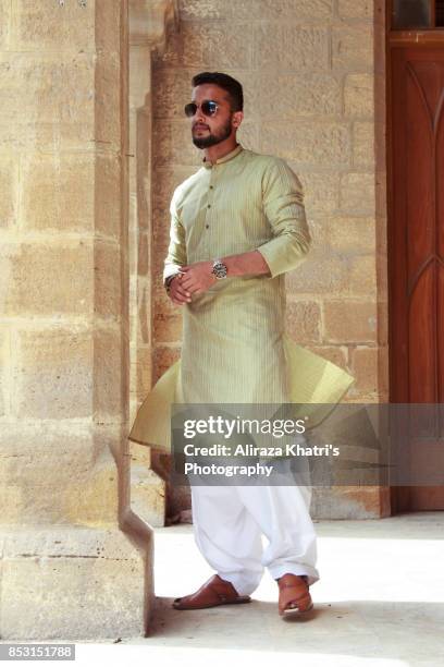 middle eastern india pakistan men's wear style - kurta stock pictures, royalty-free photos & images