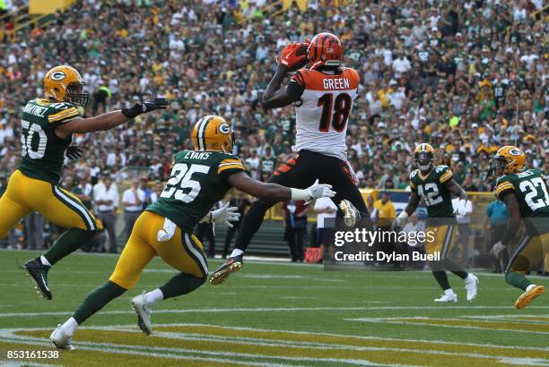 Green of the Cincinnati Bengals catches a touchdown pass during the first quarter against the Green Bay Packers at Lambeau Field on September 24,...