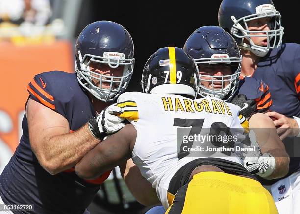 Kyle Long and Cody Whitehair of the Chicago Bears block Javon Hargrave of the Pittsburgh Steelers at Soldier Field on September 24, 2017 in Chicago,...